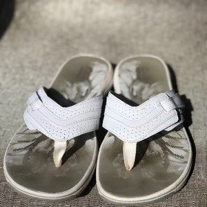 Clark’s flip flops